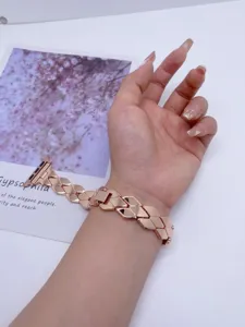 Roségouden ruitvormige metalen schakelvervangingshorlogeband geschikt voor Apple Watch.