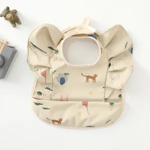 Korean style baby PU waterproof bib with cute angel wings and animal prints for feeding.