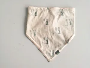Cute cotton baby bandana bib with cartoon rabbit print and snap button closure for infants.