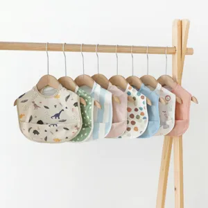 Waterproof baby bibs PU infant feeding aprons cute cartoon dinosaur polka dots for toddlers