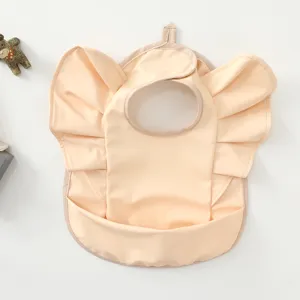 Waterproof PU baby bib with cute angel wings ruffles and crumb catcher pocket for feeding time