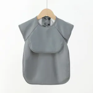 Baby waterproof PU short-sleeve feeding smock, breathable infant eating bib detail view.