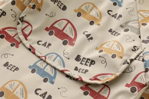 Waterproof baby feeding smock long sleeve bib with cute cartoon cars print for toddler eating.