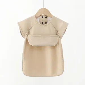 Detailed view of waterproof baby PU short-sleeve feeding smock bib featuring front pocket.