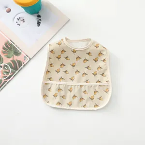 Waterproof baby bib with cute lemon pattern, easy-clean infant feeding apron detail.