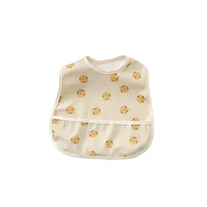 Waterproof baby bib with cute cartoon animal print, anti-mess pocket for infant feeding.