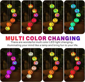Macro view showing the vibrant multi-color LED changing effect of pumpkin wind chimes