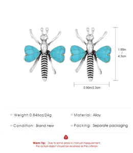 Details für Türkis-Herz-Bienenohrringe: 4,3 cm Höhe, Legierung, neuwertiger Zustand.