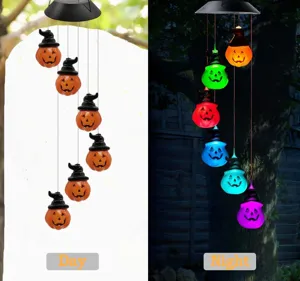 Halloween solar pumpkin wind chimes showing day and night lighting effects outdoors.