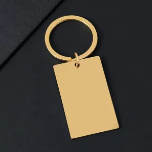 Close-up of blank gold stainless steel rectangular keychain for engraving