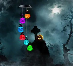 Solar powered pumpkin wind chime with witch hats for Halloween outdoor garden decor
