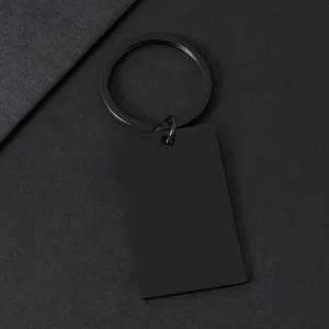 Macro view of matte black stainless steel rectangle blank keychain