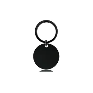 Detail view of a matte black round stainless steel blank keychain for laser engraving.