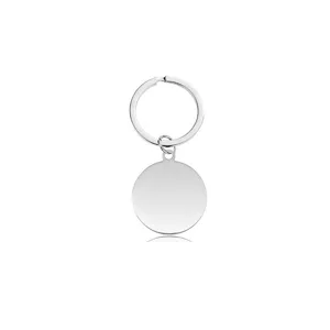 Detailed macro view of a polished stainless steel blank round keychain for custom engraving