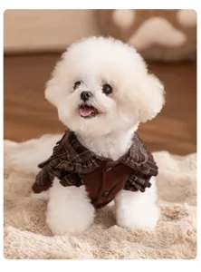 Cute pet clothing detail, brown plaid collar, thick warm puppy clothes for winter.