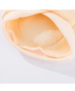 Close-up detail of soft fleece lining inside pet hoodie, showing neat stitching and warm fabric.