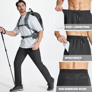 Detailed view of men's athletic pants featuring elastic drawstring waist and secure pockets.