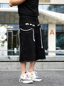 Pantaloncini jeans strass hip-hop uomo, shorts denim nero con frange stile streetwear estate.