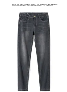 Men's washed dark grey slim fit denim jeans detail showing classic pockets and metal button.