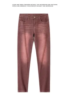 Men's slim fit casual denim trousers in stylish gradient red color for daily wear and street fashion.
