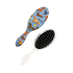 Jolie brosse à cheveux coussin d'air imprimé teckel rétro pour massage du cuir chevelu.