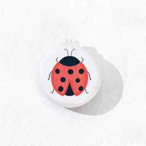 Brosse à coussin d'air pliante portable au design de coccinelle, miroir de brosse de voyage.