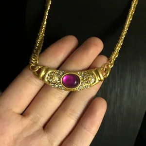 Vintage French style copper necklace with purple gemstone and sparkling rhinestones.