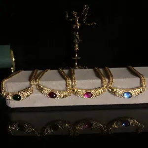 French vintage copper chain detail, rhinestone micro-set colored glass gemstone necklace close up
