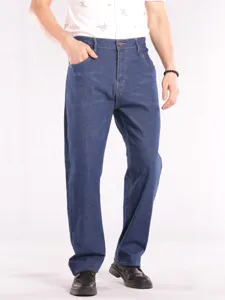 Men's loose straight-leg denim jeans detail view, high-waist design with durable blue fabric.