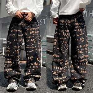 Jean homme streetwear noir ample avec imprime de lettres et style coupe jambe large chic