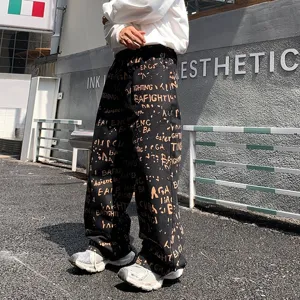 Pantalon en denim ample streetwear homme avec imprimé lettres all-over style urbain chic