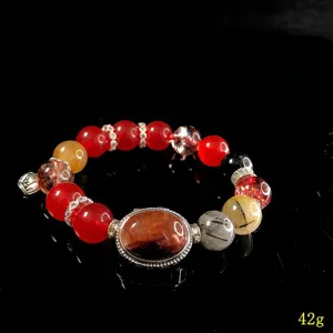 Crystal beaded bracelet detail shot, elegant gemstone design with copper accessories.
