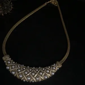 Vintage gold pearl rhinestone necklace detailed view, retro court style medieval jewelry.