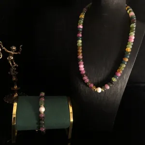 Natural multi-color tourmaline beaded necklace and bracelet set with pearl and metal accents.