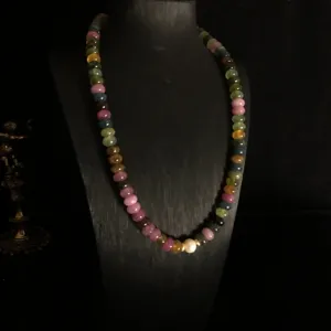 Exquisite natural tourmaline flat bead necklace detail with center pearl, elegant retro jewelry.