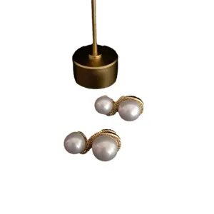 Pendientes de perlas dobles con cadena retorcida dorada vintage estilo de diseño para mujeres