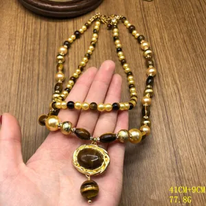 Vintage Maillard beaded tiger-eye pendant necklace, double-layered design, chic accessory.