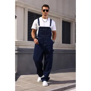 Detailed view of men's dark blue denim overalls featuring multi-pocket workwear design style.