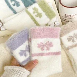 Soft fuzzy plush winter socks for women thick warm cozy home sleep floor socks with cute bow.