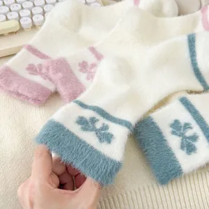 Fluffy winter warm plush socks for women, thick cozy fuzzy home floor socks detail view.