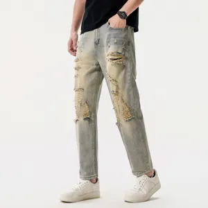 Men's vintage blue distressed loose straight cropped denim jeans casual streetwear.