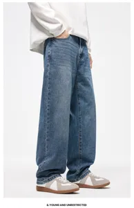 Vista dettagliata del jeans ampio dritto in denim con lavaggio blu vintage streetwear.