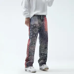 Men's loose straight fit casual jeans featuring stylish all-over paisley patchwork print.