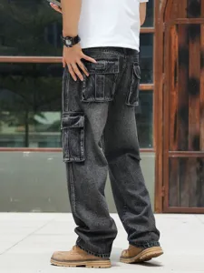 Detail view of men's heavy wash cargo jeans, loose straight leg fit with multiple pockets.