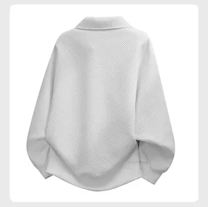 Men's white casual textured sweatshirt detail view, oversized fit pullover for autumn.