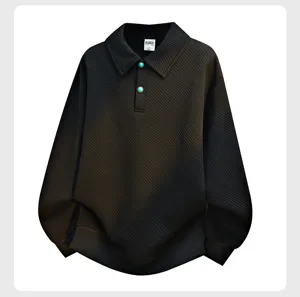 Men's oversized casual polo sweatshirt with textured geometric pattern and chic buttons.