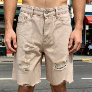 Short en denim beige déchiré pour homme, style streetwear ample avec ourlet brut bermuda