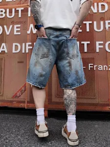 Short en jean destroy sixieme avec eclaboussures de peinture style streetwear vintage