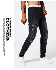 Men's stretch slim-fit ripped jeans with stylish holographic knee panels for casual wear.