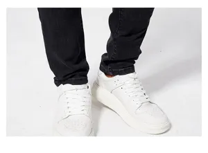 Men slim fit stretch casual trousers paired with stylish white sneakers for daily wear.